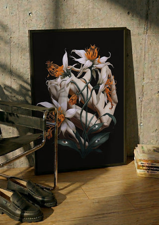 A matter of perspective by Rocio Montoya in a black frame leaning against a concrete wall by a steel chair