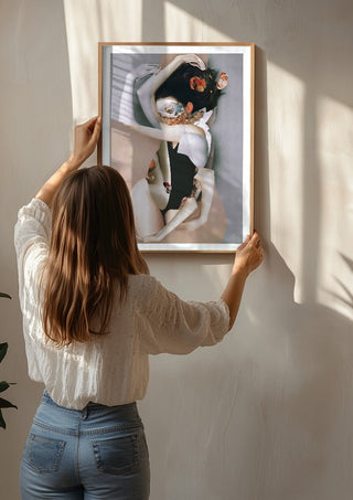 Pebbles by Rocio Montoya being hung on a sunlit wall