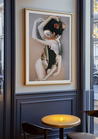 Pebbles by Rocio Montoya in an oak frame on a panelled café wall