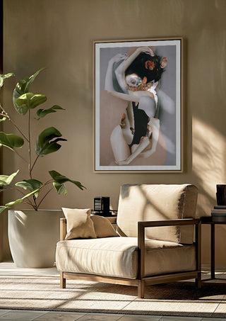 Pebbles by Rocio Montoya framed above a beige armchair beside a potted plant