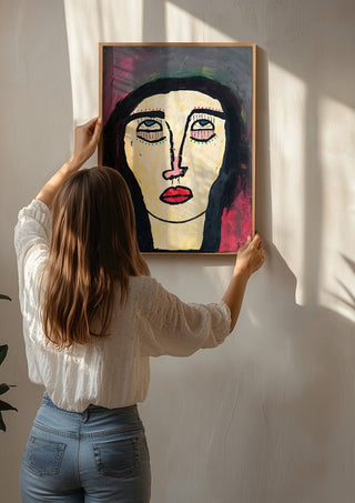 Rock n Roll by RR being hung on a sunlit wall