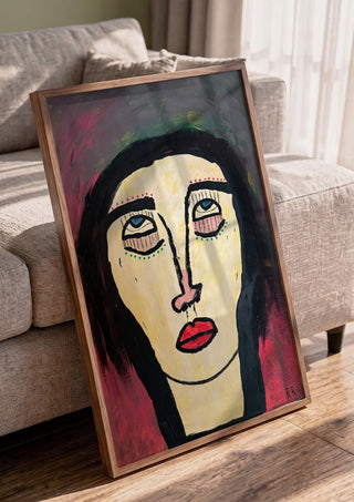Rock n Roll by RR in a walnut frame leaning against a grey sofa