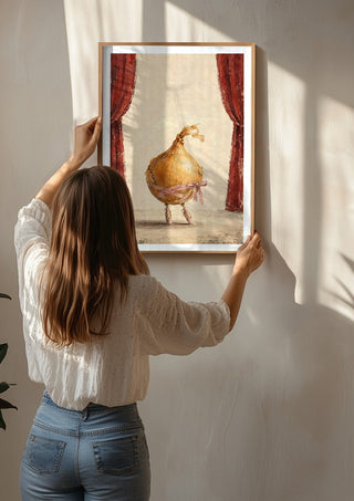 The Onion’s Last Dance by Matthews Gallerie being hung on a sunlit wall