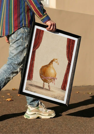 The Onion’s Last Dance by Matthews Gallerie carried in a black frame along a sunny street