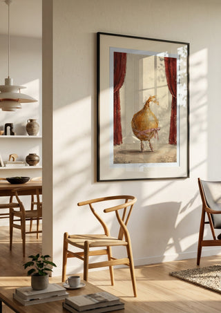 The Onion’s Last Dance by Matthews Gallerie in a black frame in a bright dining room with wooden chairs