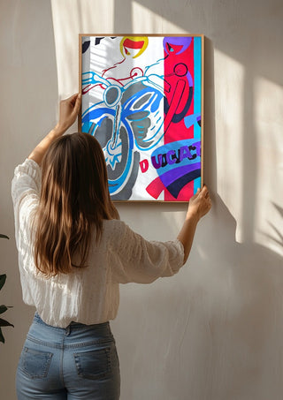 Homage to ducati by NKo being hung on a sunlit wall