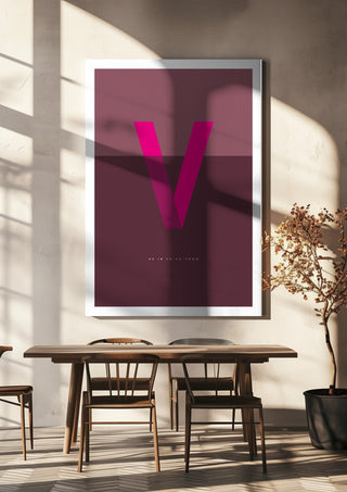 V as in Va-va-voom – Cerise by Quite Nice Prints hanging above a wooden dining table in warm sunlight