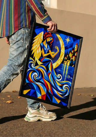 Luna by Andreas Gerlach carried in a black frame along a sunny street