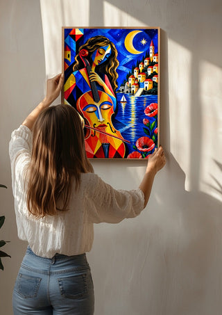 Melody of the Blue Night by Andreas Gerlach being hung on a sunlit wall
