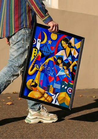 The Divine Touch by Andreas Gerlach carried in a black frame along a sunny street