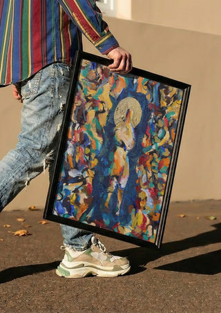 The Halo Up Close by António D'Albuquerque carried in a black frame along a sunny street