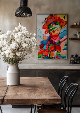 The little frog by Nittaart in a black frame above a rustic table with white flowers