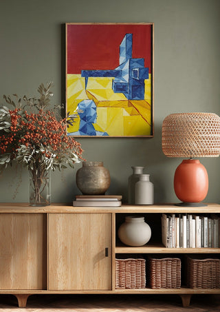 Facing the Monument by Linor Citaku above a wooden sideboard on a sage green wall