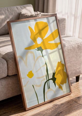 Yellow Flowers by ThingDesign in a walnut frame leaning against a grey sofa