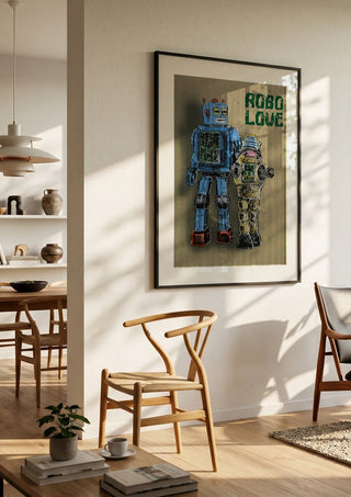 Robo Love by Carl Smith ART in a black frame in a bright dining room with wooden chairs