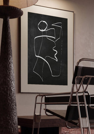 Form in Motion by ThingDesign framed in a dim room beside a tubular steel chair
