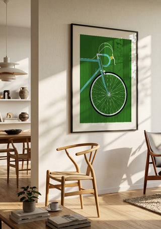 Italian Racing Bike - Detail by Bo Lundberg in a black frame in a bright dining room with wooden chairs