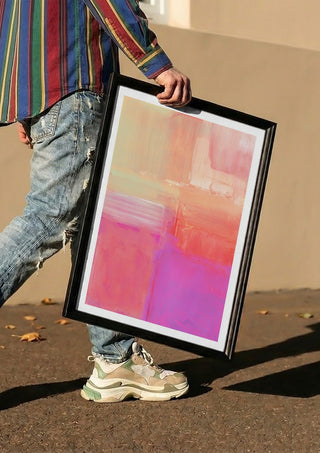 soft atmospheric composition by Iris Lehnhardt carried in a black frame along a sunny street