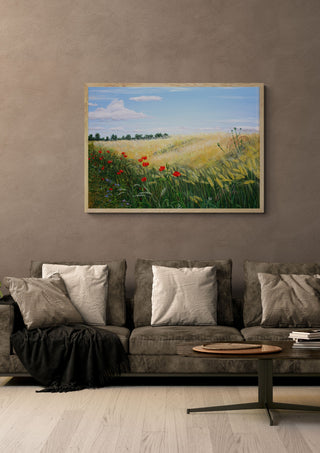 Summer by Juergen Duerrmann in a light oak frame above a grey sofa on a warm brown wall