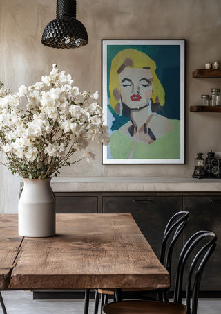 Marilyn Monroe by creatievananne in a black frame above a rustic table with white flowers