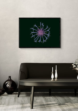 Cornflower in the Dark by Creationsbyeditabrus in a black frame on a pale wall above a dark sofa with candlesticks