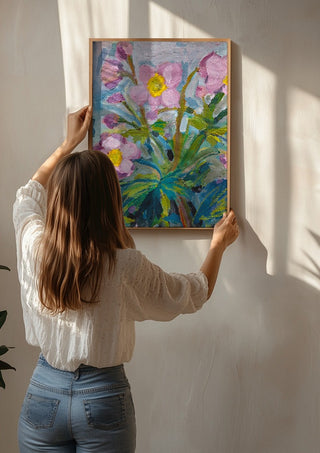 Japanese Anemone by DNF being hung on a sunlit wall