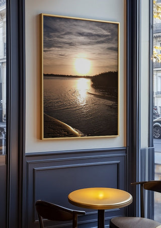 Light Finding the Shore by Bora Kőhalmi in an oak frame on a panelled café wall