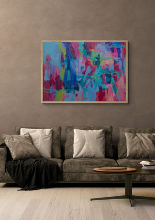 In The Flow by Janet Bell in a light oak frame on a warm grey wall above a brown sofa