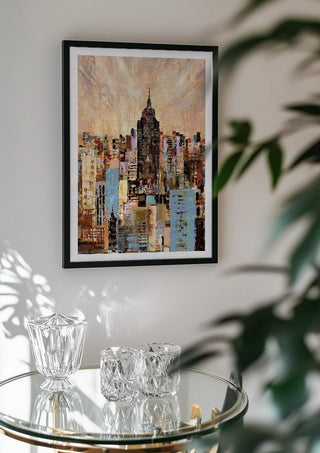 NYC by Art Anne Lee in a black frame above a glass table with crystal glassware