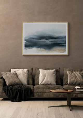 The receding horizon by Tania Zubareva in a light oak frame on a warm grey wall above a brown sofa