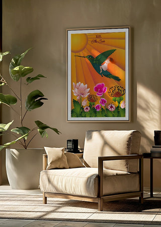 The Sun by Sciurus tarotus framed above a beige armchair beside a potted plant