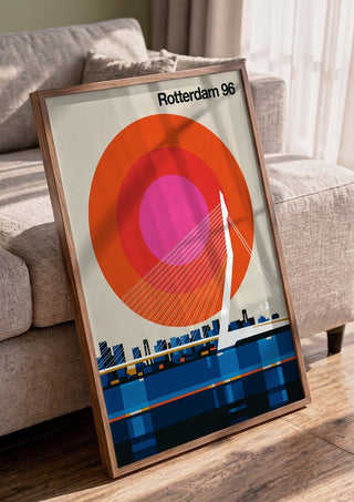 Rotterdam 96 by Bo Lundberg in a walnut frame leaning against a grey sofa