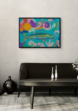 Pike by Sulaika Martis in a black frame on a pale wall above a dark sofa with candlesticks