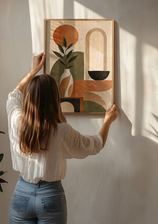 Abstract Earth-Tone Still Life by TimlessArtworks being hung on a sunlit wall