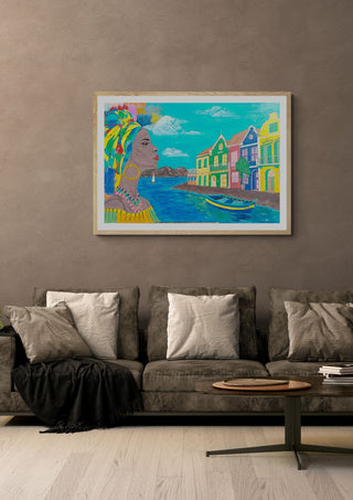 Antillean colors by Sulaika Martis in a light oak frame on a warm grey wall above a brown sofa