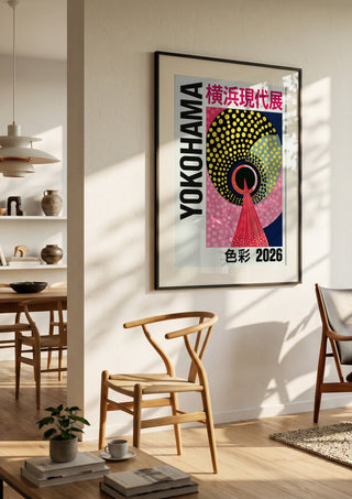 Circles and Colour by Yokohama in a black frame in a bright dining room with wooden chairs