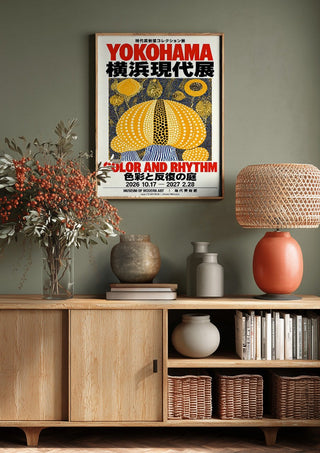 Color and Rhythm Poster by Yokohama above a wooden sideboard on a sage green wall