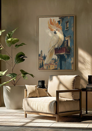 A Balcony of One’s Own by Matthews Gallerie framed above a beige armchair beside a potted plant