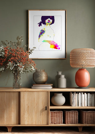 Teenage by Bent Hardervig above a wooden sideboard on a sage green wall