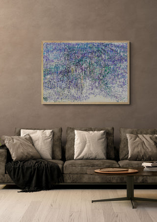Usual Landscape by Priit Ruttas in a light oak frame on a warm grey wall above a brown sofa