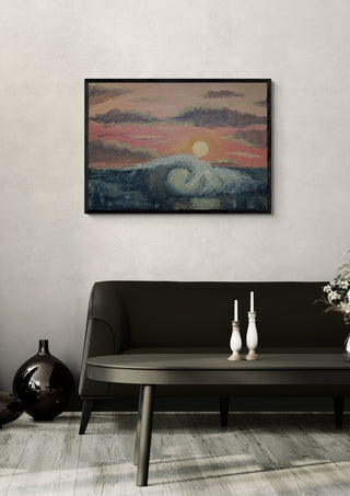 Into the Sun by Zhan Snow in a black frame on a pale wall above a dark sofa with candlesticks