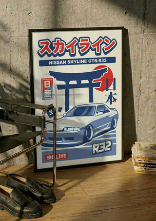 Nissan Skyline GT-R R32 by Kaminarirace in a black frame leaning against a concrete wall by a steel chair