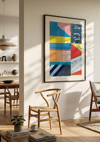 403 by Kareem Rizk in a black frame in a bright dining room with wooden chairs
