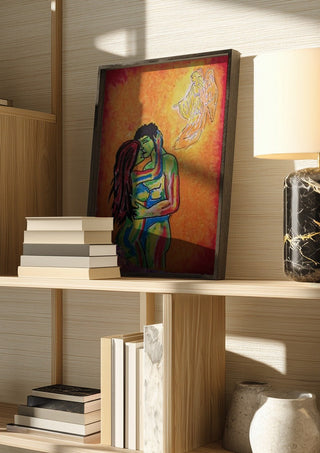 Liebe und Psyche by Olaf Baier in a dark frame on a wooden shelf beside books and a lamp