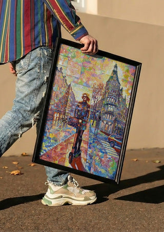 Elegans by Ramz Gadzh carried in a black frame along a sunny street