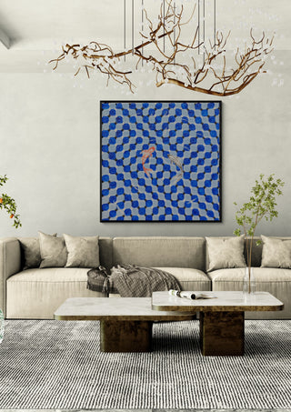Pool by Zhan Snow in a black frame above a beige sofa under a branch chandelier