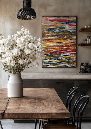 Feelings by Tonia in a black frame above a rustic table with white flowers