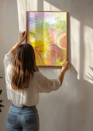Let the sunshine in by FridaRit being hung on a sunlit wall
