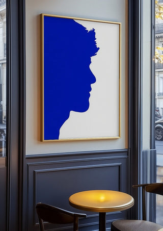 Projected personality by Tonia in an oak frame on a panelled cafe wall