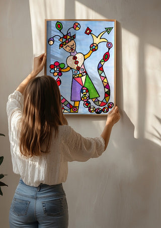Figure with a Heart by Steffi Seiler being hung on a sunlit wall